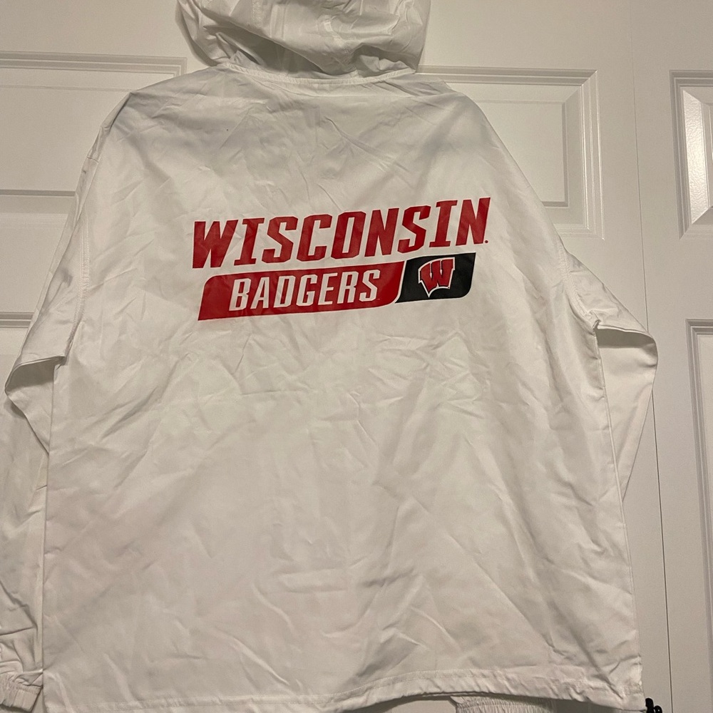 Half Zip Champion brand windbreaker with Wisconsin Badgers logo on the back
